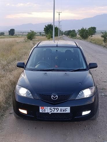 Mazda Demio: 2003 г., 1.5 л, Автомат, Бензин, Хэтчбэк