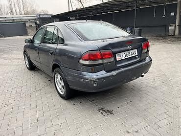 матор авто: Mazda 626: 2000 г., 1.8 л, Механика, Бензин, Седан — 6