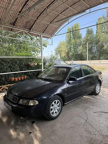 Audi A4: 1994 г., 1.8 л, Механика, Бензин, Седан