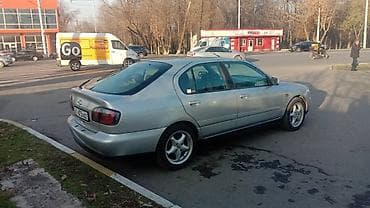 Транспорт: Nissan Primera: 2000 г., 1.8 л, Кол менен иштөөчү, Бензин, Лифтбек — 3
