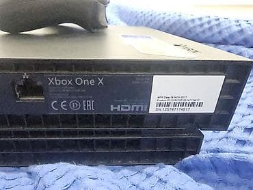 самый дешёвый xbox: Xbox One X, 1 ТБ. Комплект: консоль, 1 оригинальный беспроводной — 2