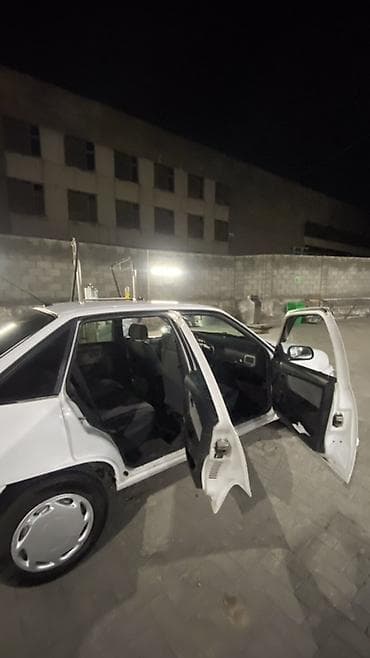 spark 7: Chevrolet Nexia: 2010 г., 1.5 л, Механика, Бензин, Седан — 5