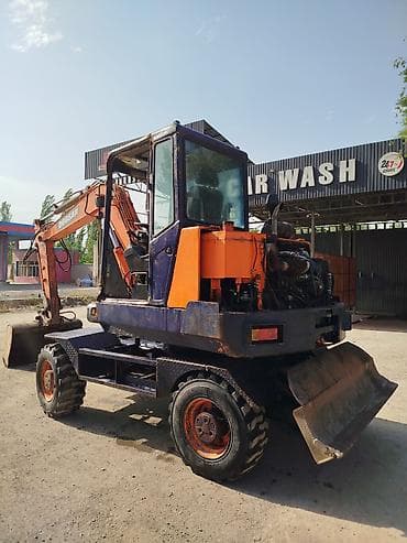 купить колесный экскаватор бу: Экскаватор, Doosan, 1999 г., Колесный — 4
