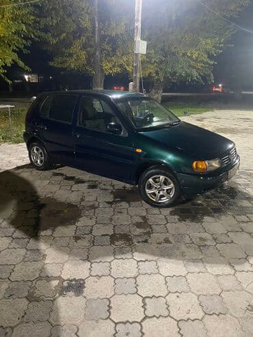 возможен обмен на дом: Volkswagen Polo: 1996 г., 1.4 л, Механика, Бензин, Хэтчбэк — 3