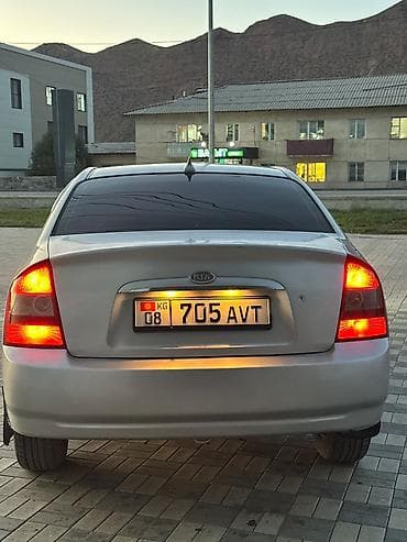 именные рамки на авто: Продаётся седан Kia Cerato серебристого цвета. Автомобиль 4-дверный — 1