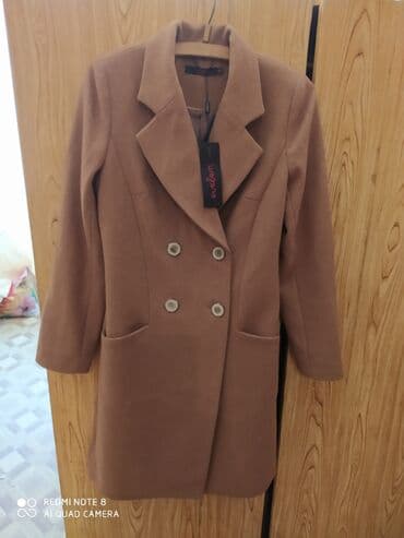 Новое пальто. Размер приблизительно 42-46