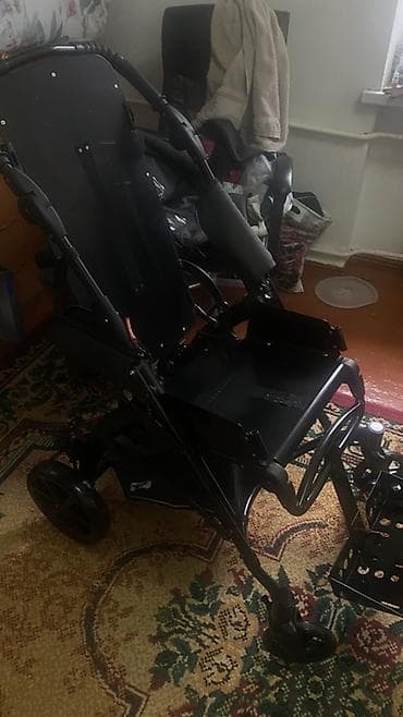 массажные кушетка: Прогулочная инвалидная коляска Patron (детская) - Шасси с поворотными — 1