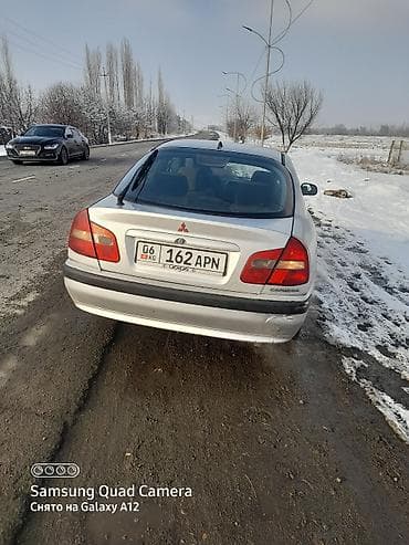 3 sfe: Mitsubishi Carisma: 2000 г., Седан — 2