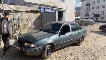 китайски машина: Daewoo Nexia: 1996 г., 1.5 л, Механика, Бензин, Седан — 4