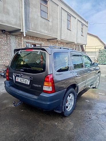 сиденье передние: Mazda Tribute: 2003 г., Кроссовер — 7