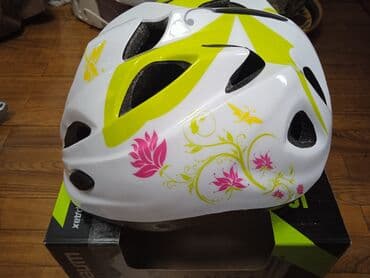 камеры для велосипедов: Велосипедный шлем белого цвета с ярким рисунком, включающим желтые — 3
