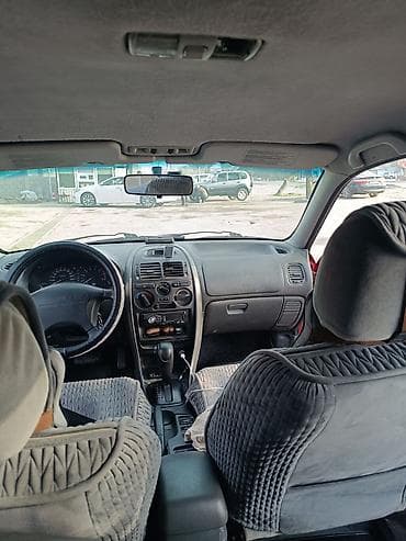 митсубиси паджеро 4: Mitsubishi Carisma: 1997 г., 1.8 л, Автомат, Седан — 7