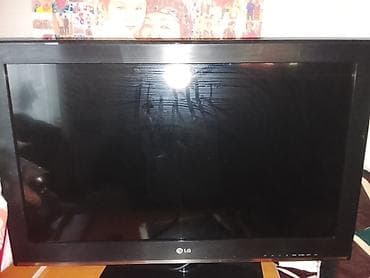 Телевизор LG с плоским экраном, диагональ около 32–37". Особенности