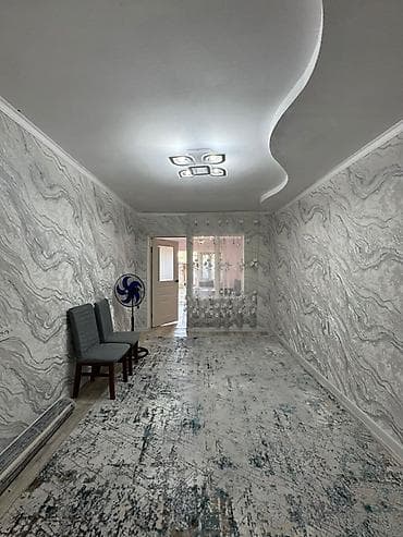 Просторная комната и кухня-столовая в светлой отделке - Комната