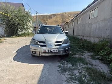 Mitsubishi Airtrek: 2004 г., 2.4 л, Механика, Бензин, Кроссовер — 1