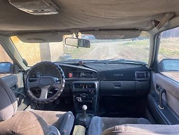спарк монитор: Mazda 626: 1988 г., Механика, Седан — 4