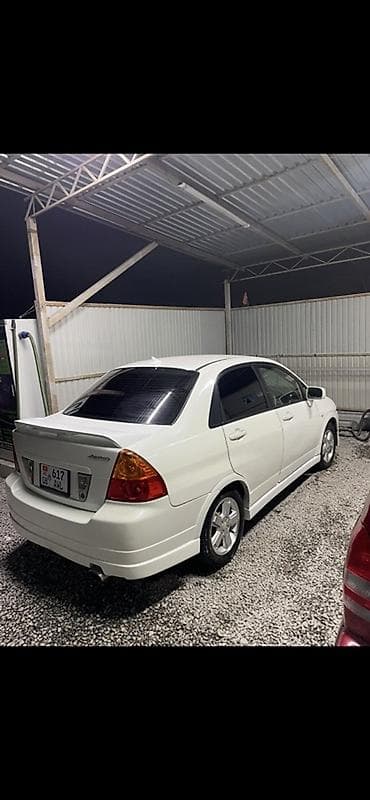 subaru forester2000: Suzuki Aerio: 2004 г., 1.8 л, Автомат, Бензин — 1