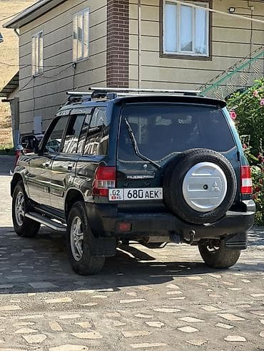 sprinter 315: Mitsubishi Pajero iO: 2004 г., 2 л, Автомат, Бензин, Внедорожник — 6