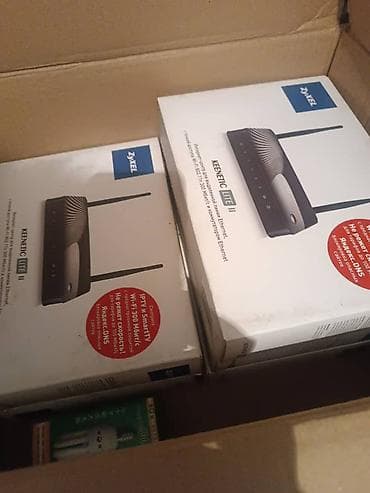 Модемы и сетевое оборудование: Wi‑Fi роутеры ZyXEL Keenetic Lite II + управляемые коммутаторы D‑Link — 2