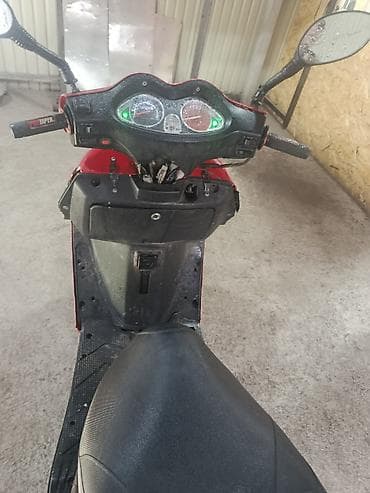 скутеры новый: Скутер Vento (-150 см³ по классу модели) в чёрном цвете. Особенности — 4