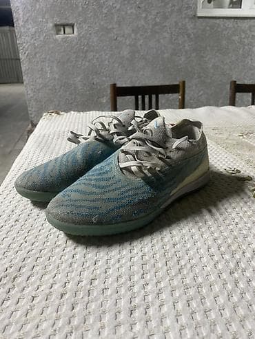 мир обувь: Футбольные бутсы Nike Phantom GT для игры на зальных покрытиях и — 1