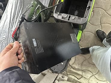 литий ионные аккумуляторы: Электроскутер с выносным литий-ионным аккумулятором - Тип — 2