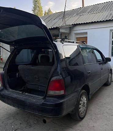 tsunami 100: Honda Odyssey: 1995 г., 2.2 л, Автомат, Бензин, Минивэн — 3