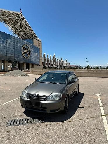 Toyota Corolla: 2002 г., Кол менен иштөөчү, Бензин, Седан