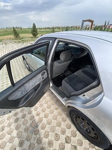 down pipe: Mazda 626: 1998 г., 2 л, Механика, Бензин, Седан — 7