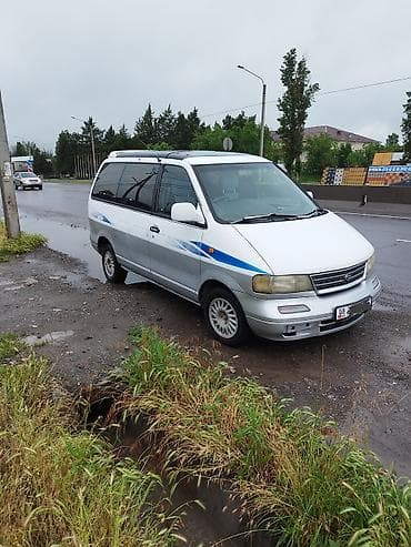 боковой: Nissan Largo: 1996 г., 2.4 л, Автомат, Бензин, Минивэн — 4