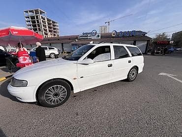 асфальт реска: Opel Astra: 2001 г., 1.8 л, Ручные, Бензин, Универсал — 1