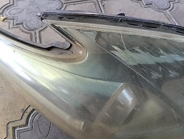 бегущий поворотник: Передняя левая фара Toyota — 2