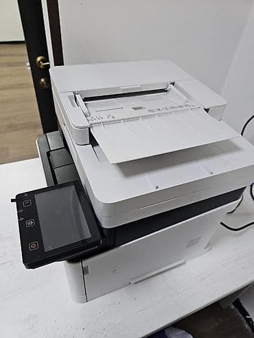 Принтеры: Продаю цветное лазерное МФУ Canon i-SENSYS MF657Cdw белого цвета Цена — 3