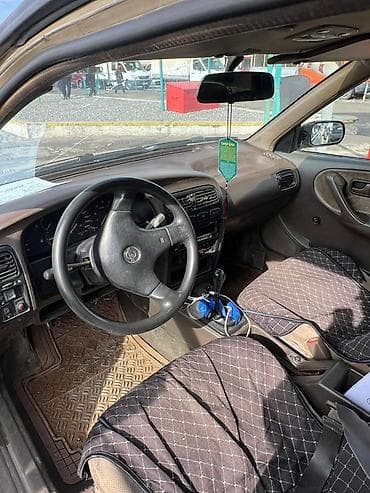 исфана уна: Nissan Primera: 1991 г., Механика, Бензин, Седан — 7