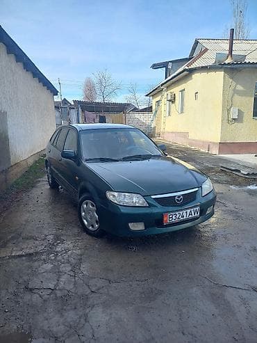 одмен машина: Mazda 323: 2002 г., 1.6 л, Механика, Бензин, Универсал — 2