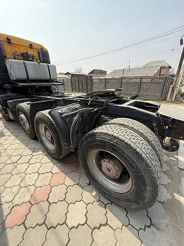 Башка транспорт: Двухмостовый (4x4 или 6x4) грузовик MAN 1997 года — это обычно серия — 1