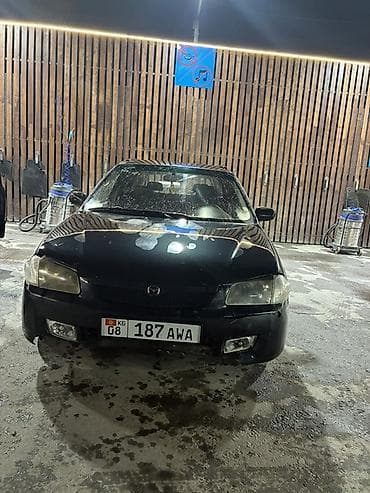 prius 30: Mazda 323: 2000 г., 1.6 л, Ручные, Бензин, Хэтчбэк — 5