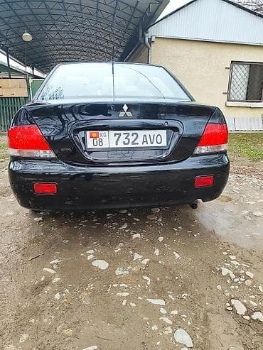 Mitsubishi Lancer: 2003 г., 1.6 л, Механика, Бензин, Седан