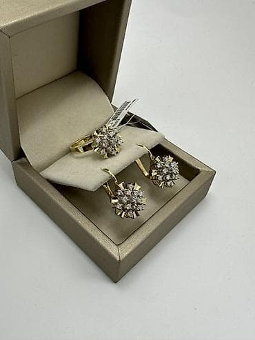 Золотой комплект с бриллиантами 0,97К 585проба желтая золото Вес