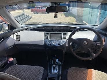 каракол авто: Nissan Primera: 2001 г., 2 л, Автомат, Бензин, Универсал — 6