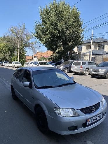 spark 2012: Mazda 323: 2002 г. — 3