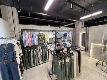 оборудование в бутик: Стеллажи для бутика одежды Кронштейны для бутика одежды Торговое — 4