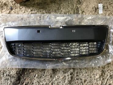 запчасти на опель астра н: Решетка радиатора Chevrolet 2011 г., Новый, Аналог — 1