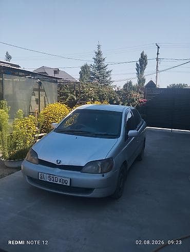 крыло калдина: Toyota Platz: 2001 г., Седан — 2