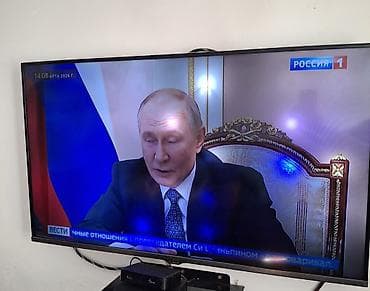 крепление на тв: LED-телевизор с диагональю около 40–43" - Тонкие рамки, настенное — 1