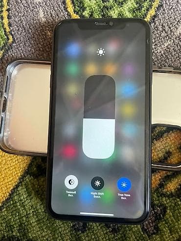 Автоэлектроника: IPhone 11, Б/у, 64 ГБ, Черный, Чехол, 73 % — 2