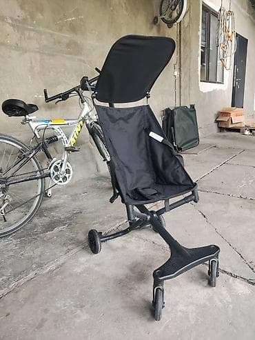 коляска летние: Компактная прогулочная коляска черного цвета с солнцезащитным — 4