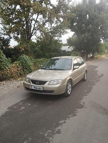 e2 byd: Mazda 323: 2002 г., 1.6 л, Механика, Бензин, Хэтчбэк — 8