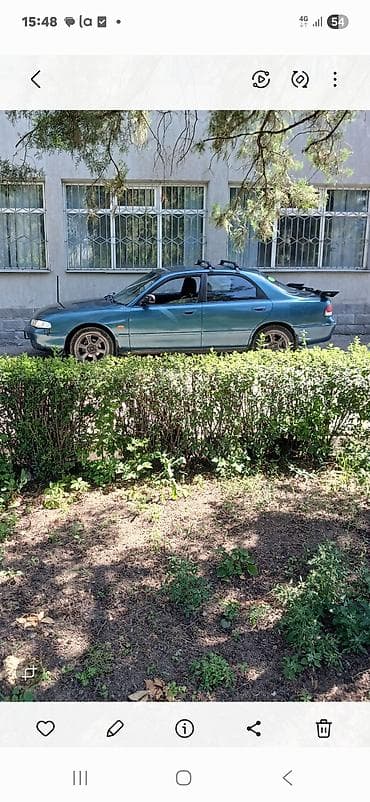 demio бампер: Mazda Cronos: 1993 г., 2 л, Автомат, Бензин, Седан — 1