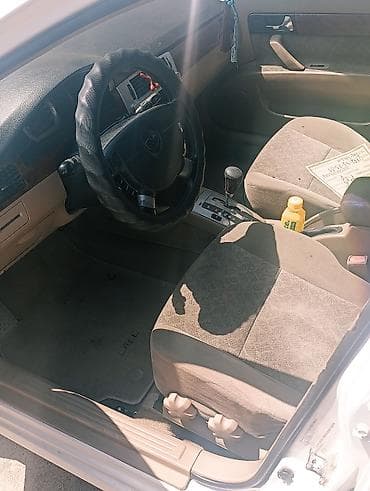 рено лагон: Daewoo Lacetti: 2003 г., 1.5 л, Автомат, Газ, Седан — 8